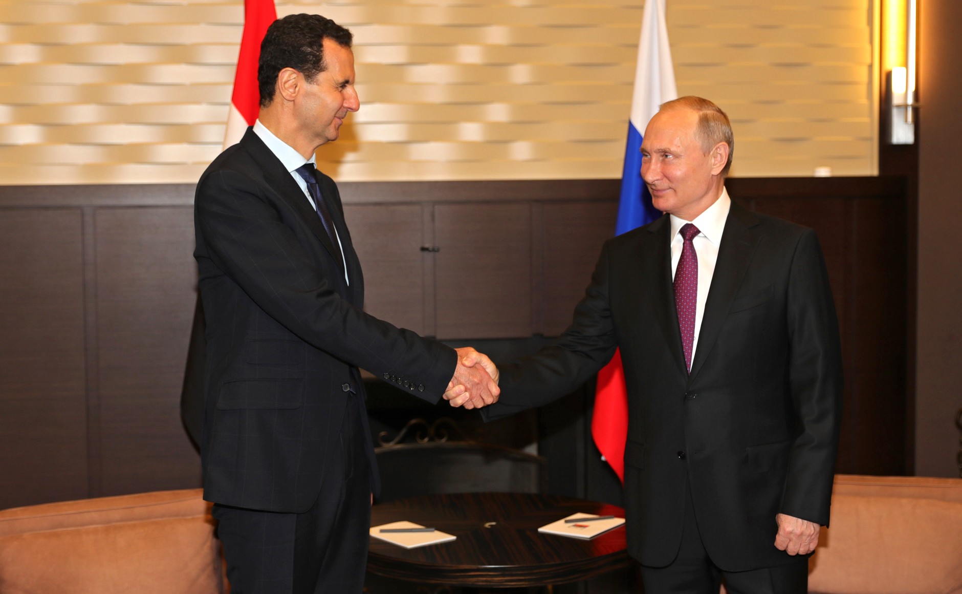 Bashar al-Assad em encontro com Vladimir Putin, em 2018, na Rússia