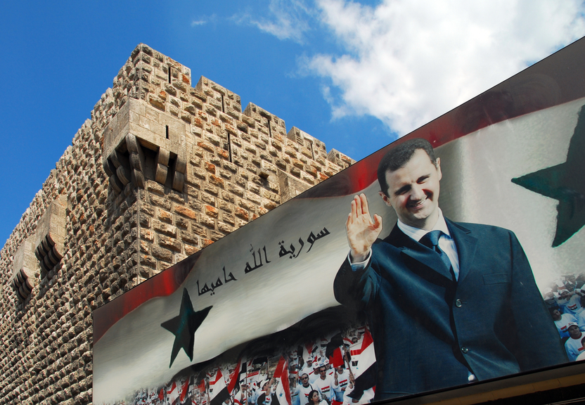 Cartaz com o presidente da Síria, Bashar al-Assad, em Damasco (imagem: iStock)
