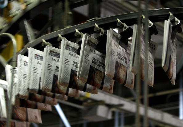 Dwindling Newspaper Sales Echo Through Economy