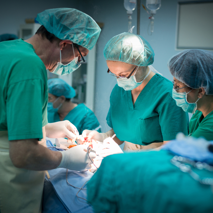 Team of surgeons during real operation